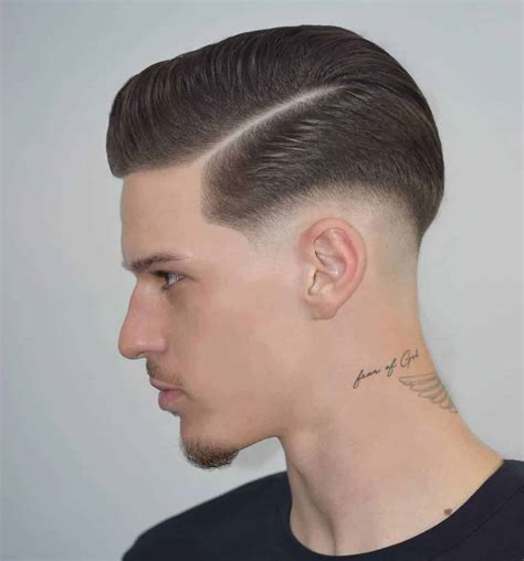 low fade en u|low fade with side part.